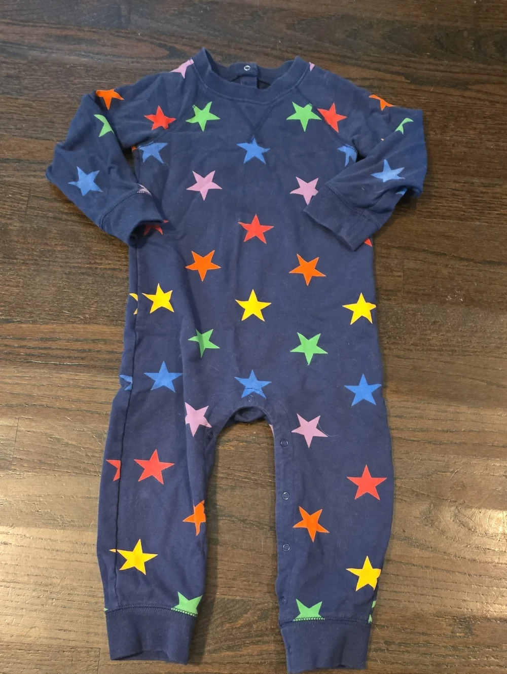Primary Navy Footed One-Piece with Multicolor Stars